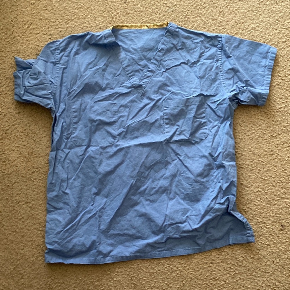 Blue scrub shirt size M women.